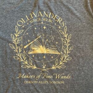 Harry Potter Olivander’s Gray T-Shirt with Gold Design
